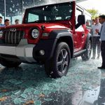 Viral Video: Woman throws Thar worth Rs 27 lakh down from the first floor of showroom